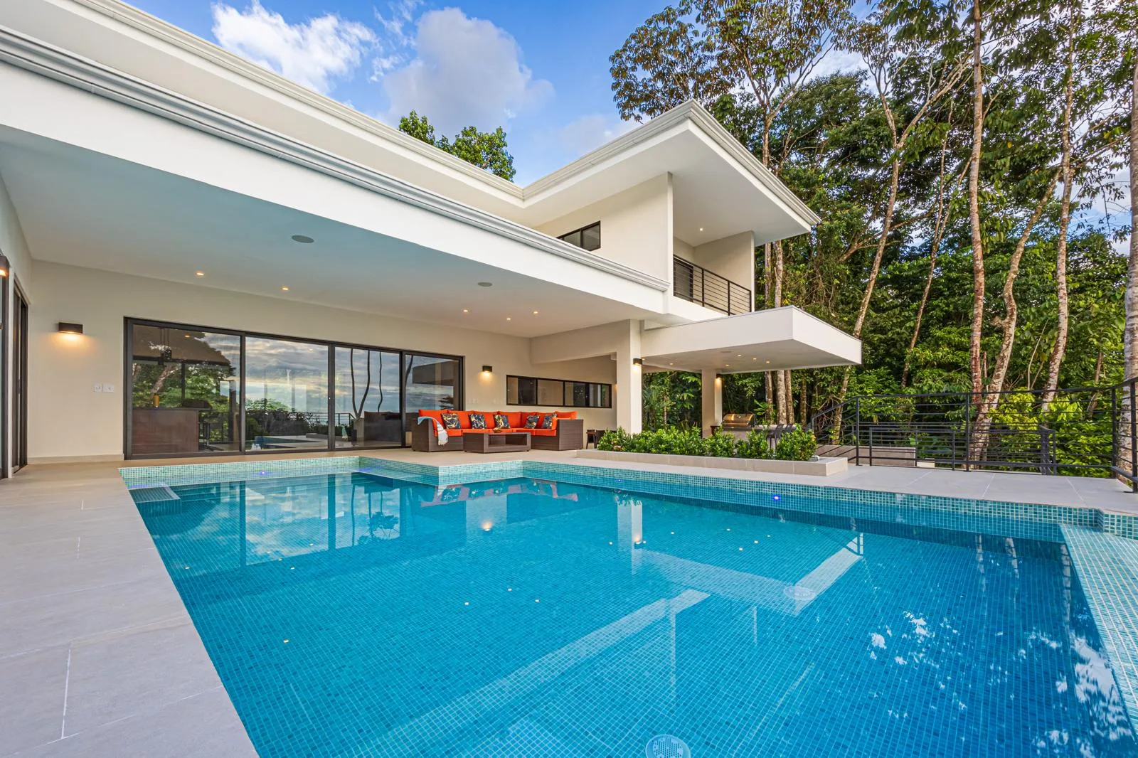 Pool and glass railing detail in daylight